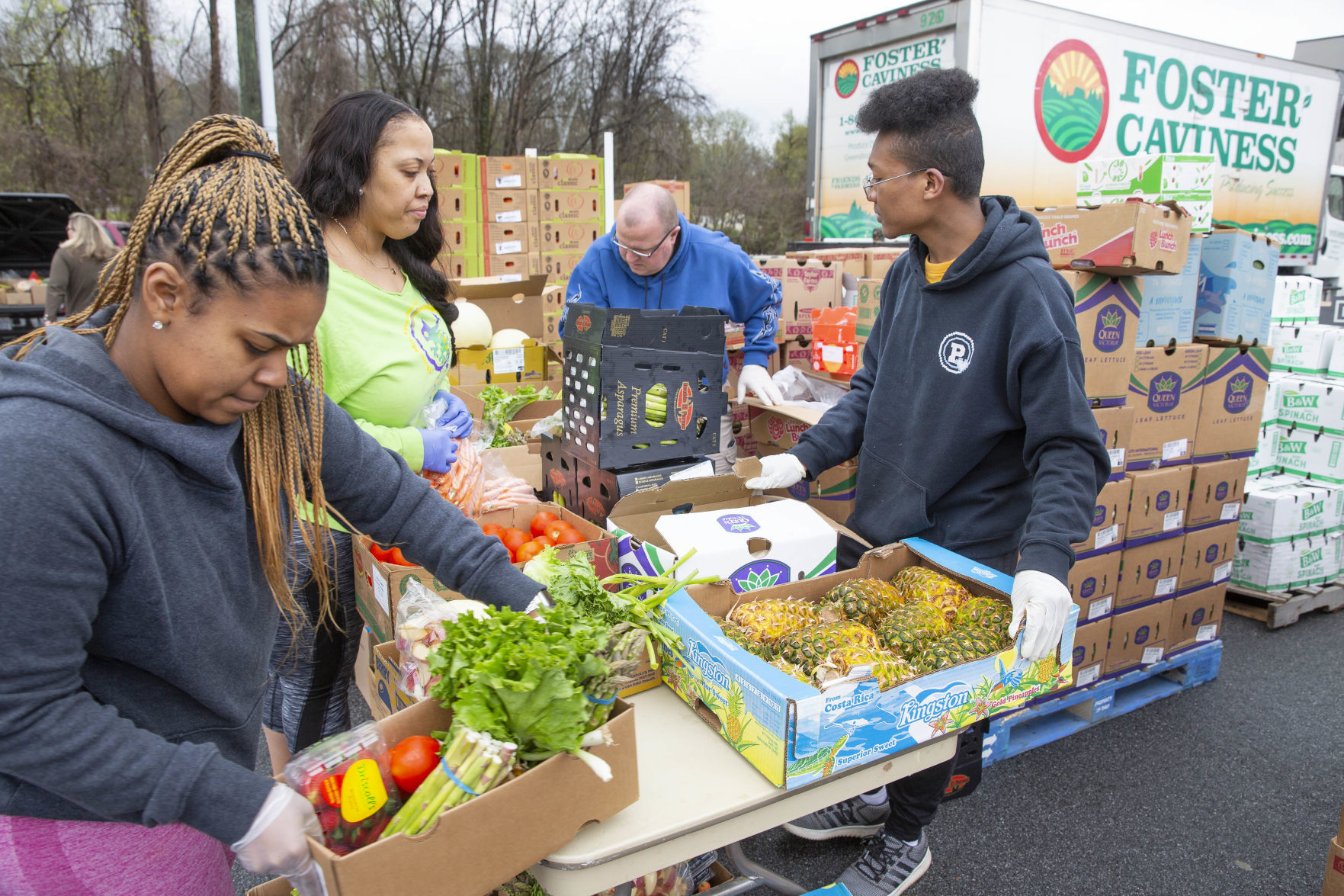 Crowds flock to produce giveaway at Daystar Church